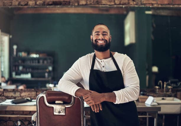 Fama Barber Shop and Beauty Salon Logo