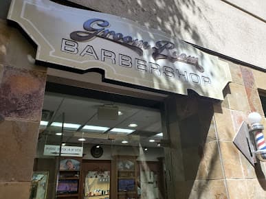 Fama Barber Shop and Beauty Salon Logo